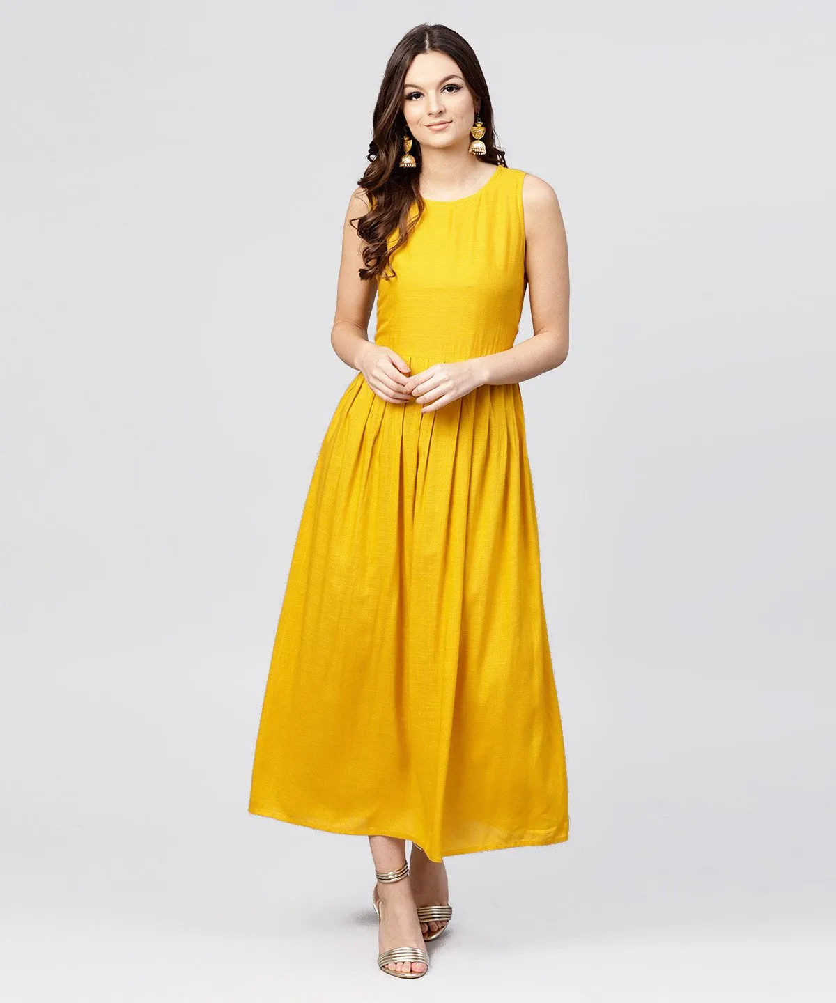 Bright Yellow Rayon A-Line Box Pleated Maxi With Attached Jacket Till Yoke And Emblished With Tassels